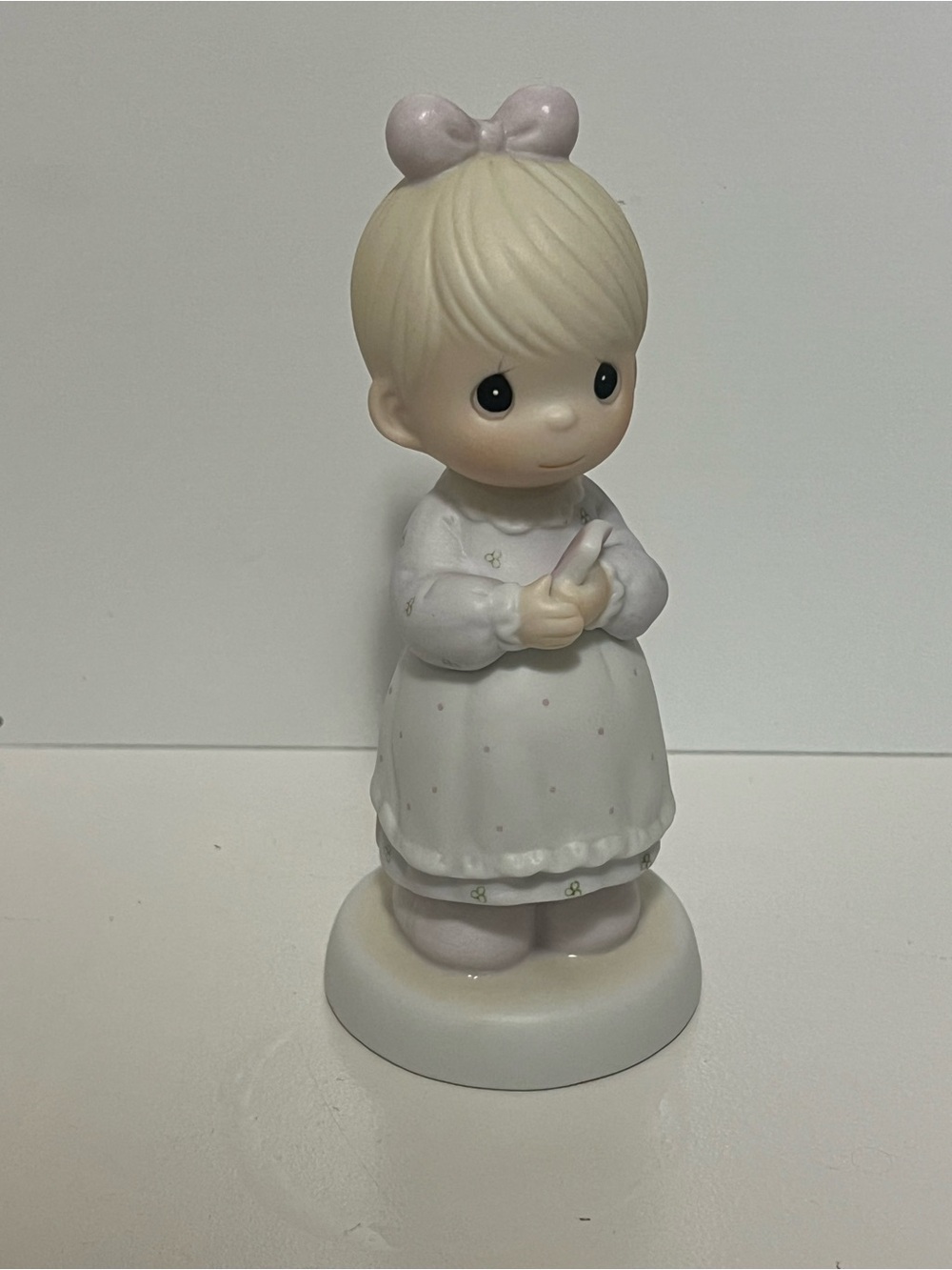 Precious Moments figurine “The Good Lord Always Delivers” from 1989
